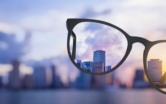 City skyline defined by glasses lenses