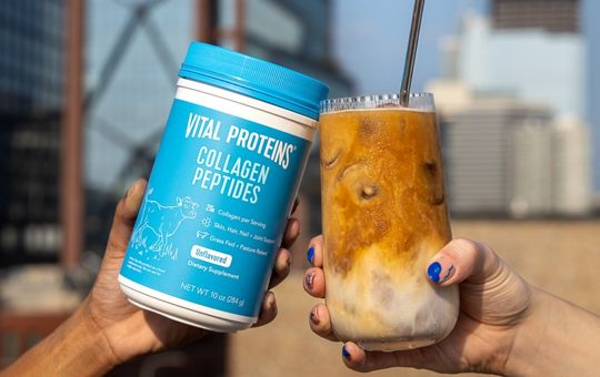 iced coffee toasting a container of vital proteins collagen peptides